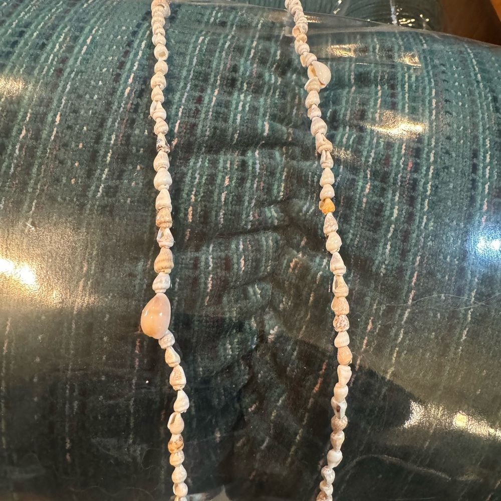 - Puka shell necklace